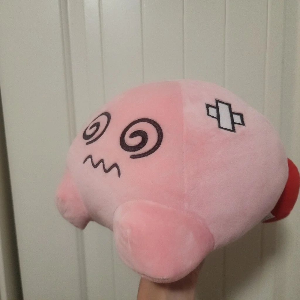 Stressed swirl eyes plush